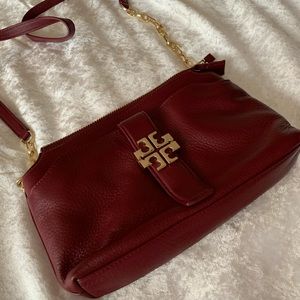 Tory Burch Meyer cross-body in red/burgundy.